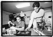 Down from the mountain, Ben Pederson (left) and Mike Kossian take computers apart at Sultan Junior High.