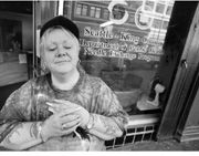 Ronnie Holt, an employee at the needle exchange program, outside the building slated for condemnation.