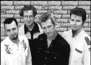 Luther Wright (center) and the Wrongs Rebuild the Wall.