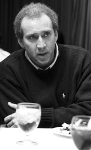 Cage sweats through a pitch meeting.