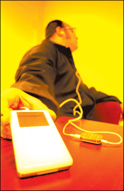 iPod, Apples breakthrough music box, shown here at damn near actual size.