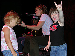 Rachel Flotard, middle, plays for Ruby Heathman (daughter of the Supersuckers' Ron Heathman) and Quattro (son of Eddie Spaghetti).