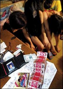 A brothel bust in China: While human trafficking takes many forms, the new abolition activists focus on "sex slavery," broadly defined as any form of prostitution, legal or illegal.