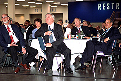 Seated at the table, from left: Bob Watt of Boeing, Rita Ryder of the YWCA, Bob Drewel of the Puget Sound Regional Council, Brad Smith of Microsoft, and Seattle City Council member Richard McIver.