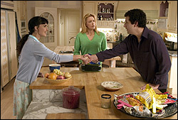 Saintly maid (Vega, left), crazy wife (Leoni, center), and saintly husband (Sandler): is Brooks dissing his own ex?