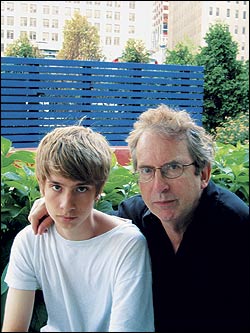 Carey and son bond over comics and commodes.