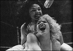 The Fabulous Moolah (left) gets tough.