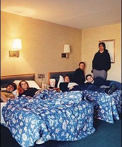 Left to right: Kurt Dahle, Neko Case, John Collins, Carl Newman, Blaine Thurier, and Todd Fancey (missing: Dan Bejar).