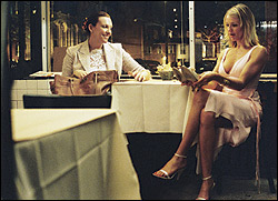 Collette (left) and Diaz share a moment over&mdash;what else?&mdash;shoes.