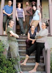 Members of the Emma Goldman Finishing School (clockwise from bottom left): Mitchell Johnson, Parke Burgess, Addy Adwell, Sheldon Cooper (founder), Darlene Johnson (friend of the commune), Thea Schnase, Jamie Lee Northern (standing), and Katie Howenstine.