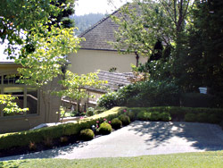The little house near the fence has neighbors howling.
