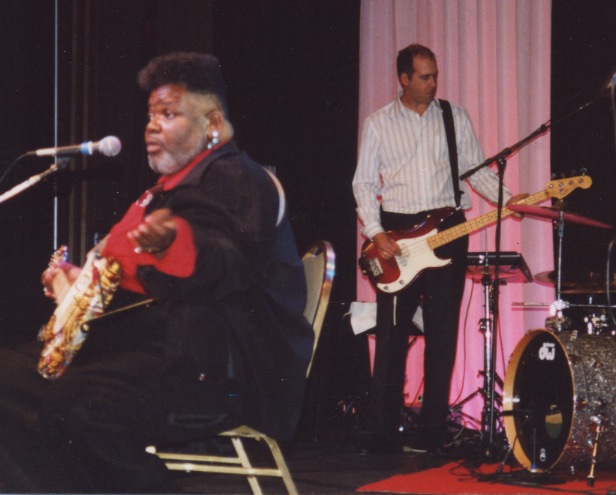 Buddy Miles explains the difference between Droop Quota and Gregory Method during Single Transferable Vote lecture while Novoselic holds down Band of Gypsy's groove.