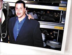 According to SPD, David Romano (pictured here) is a 6-foot-2-inch blond with a pierced eyebrow.