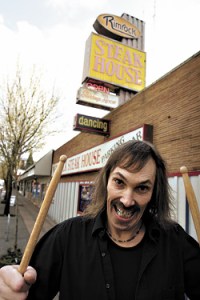 The beneficiary of no formal training, Fred Holzmans playing style and facial expressions have been compared to The Muppet Shows Animal.