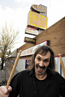 The beneficiary of no formal training, Fred Holzmans playing style and facial expressions have been compared to The Muppet Shows Animal.