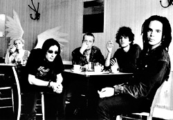 Vintage Swervies:The dude in sunglasses is truly shoegazing.