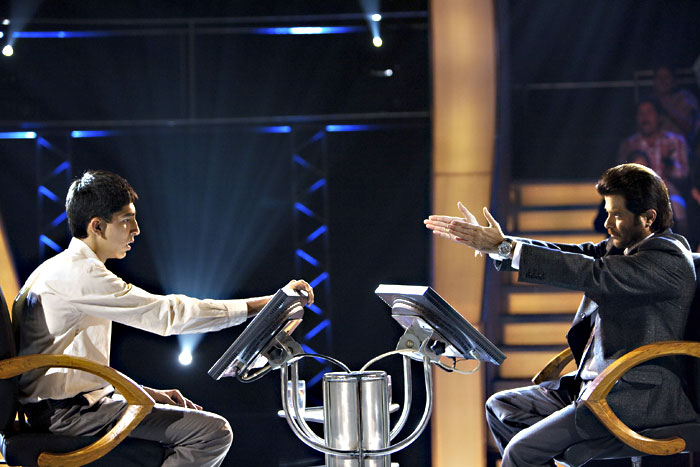 Show host Anil Kapoor (right) has a few questions for Patel.