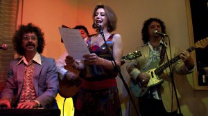 Buy (at center) wants more.