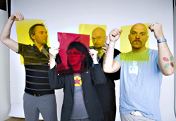 Iverson (in tie) and bandmates:a transparent shtick.