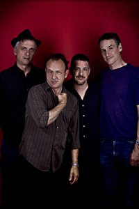 Yow (second from left) keeps his pants on these days.