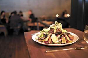 Plums Mama Africa Salad has just about everything under the sun fruits, greens, avocado, fake bacon&nbsp;.&nbsp;.&nbsp;.