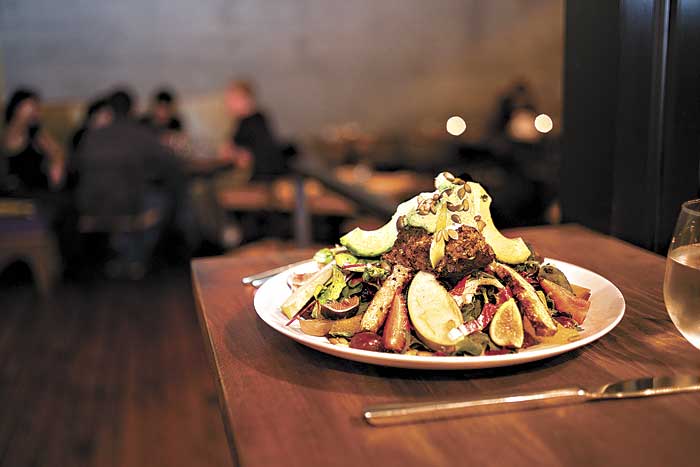 Plums Mama Africa Salad has just about everything under the sun fruits, greens, avocado, fake bacon&nbsp;.&nbsp;.&nbsp;.