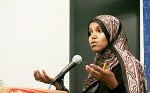 Halima Dahir speaks at a forum for Somalis.