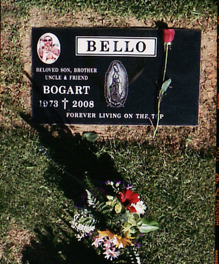 Bogart Bello’s gravestone overlooks his old gang’s East L.A. territory.