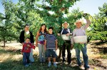Rosalio Moreno (far right) came to the valley three years ago with his family, and now owns a cherry farm.