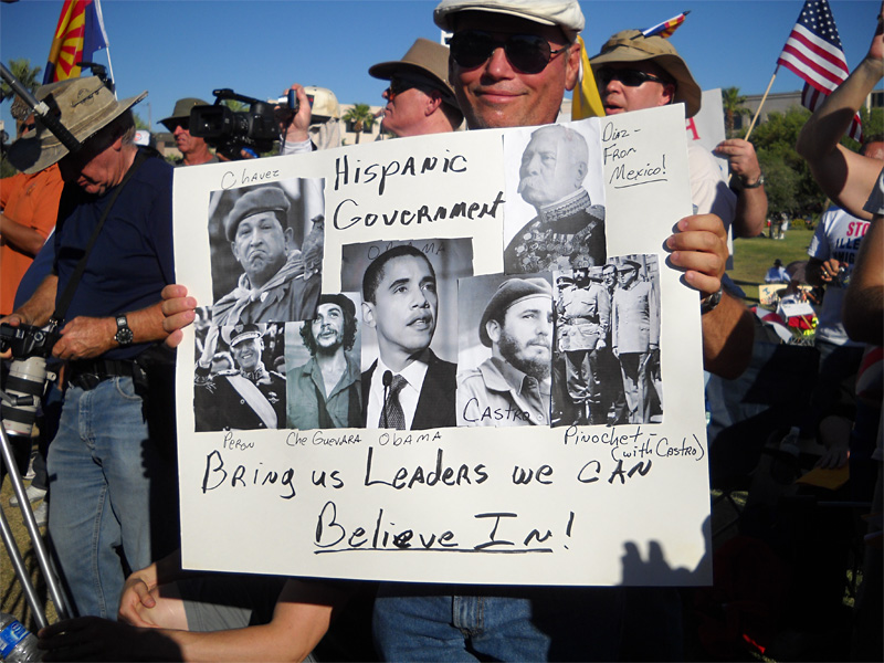 SB 1070 supporters compare Barack Obama to Latino revolutionaries at a nativist rally.