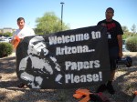 AntiSB 1070 protesters sum up the situation in Arizona.