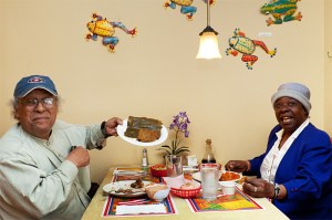Obed Gonzales (left) and Marilyn Ellen Kidd LeVias relish El Pil&oacute;n's delicious, intentionally overcooked meat. The frog never leaves.