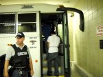 A bus for private prisons giant Corrections Corporation of America picks up migrantssentenced to time in custody by a Tucson magistrate.