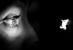 Perkins peers at Leigh in Psycho.