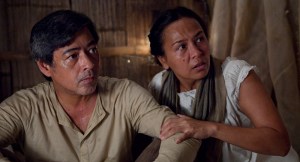 Caught in the middle: Torre's village leader (with Rio Locsin as his wife).