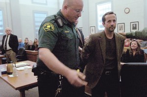 Michiel Oakes is led away at Skagit County Superior Court on Friday, Oct. 22, 2010. Oakes was convicted for the murder of celebrity dog trainer Mark Stover.