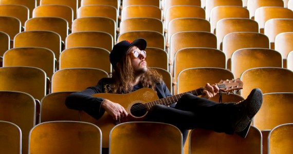 King Tuff, aka Kyle Thomas, poses for portraits at Malcolm X Academy —an abandoned school that was purchased by a real estate developer and rented out as, among other things, a recording studio— in Detroit, MI, while recording with Robert Harlow, of The Go and Conspiracy of Owls, Thursday, July 7, 2011. (Photo By Jeffrey Sauger)