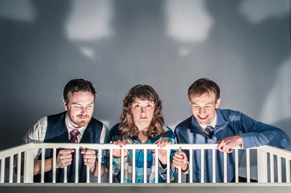 From left, Benezra, Thompson, and Hyman admire the offspring in Smudge.