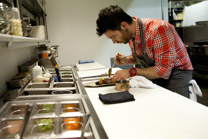Exectuive chef Garrett Melkonian platting up the Kebab.
