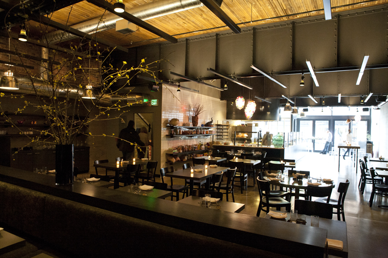 Mamnoon's sweeping, clean-lined roomaE”minimally furnished with track lighting, black tables, black chairs and a freestanding black wall between the dining area and kitchenaE”has a jangly disco energy. But if you're going out with a group or craving more vivid flavors, Mamnoon's the better restaurant.