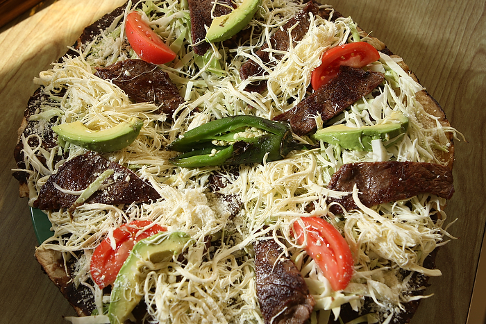 BURIEN, WA THURSDAY OCT 25 2012 El Tio Restaurant Restaurant El Tio, 452 SW 153rd St., Suite A, Burien, 242-2326. Mon.-Sun., 10 a.m.-10 p.m. Chapulines $4, Tlayuda $11.95, Molotes $7.50, Mole con pollo $8.75, Empanada de huitlacoche $9.25, Hot chocolate $3.50 (Photo By Kevin P. Casey)