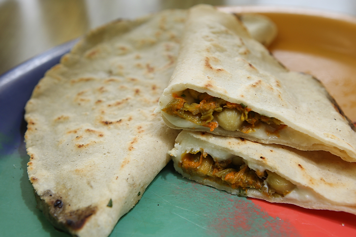 BURIEN, WA THURSDAY OCT 25 2012 El Tio Restaurant Restaurant El Tio, 452 SW 153rd St., Suite A, Burien, 242-2326. Mon.-Sun., 10 a.m.-10 p.m. Chapulines $4, Tlayuda $11.95, Molotes $7.50, Mole con pollo $8.75, Empanada de huitlacoche $9.25, Hot chocolate $3.50 (Photo By Kevin P. Casey)