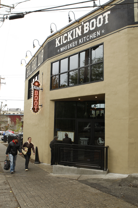 SEATTLE WA SUNDAY OCT 15, 2012 Kickin' Boot in Ballard offers an assortment of barbecue inspired dishes in the dark restaurant with large TVs and a pyramid of various bottled liquors. Photo by Kevin P. Casey/Seattle Weekly