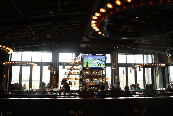 SEATTLE WA SUNDAY OCT 15, 2012 Kickin' Boot in Ballard offers an assortment of barbecue inspired dishes in the dark restaurant with large TVs and a pyramid of various bottled liquors. Photo by Kevin P. Casey/Seattle Weekly