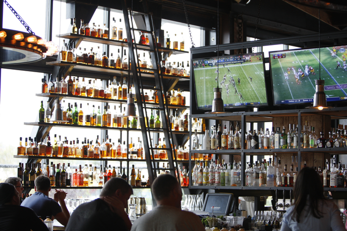 SEATTLE WA SUNDAY OCT 15, 2012 Kickin' Boot in Ballard offers an assortment of barbecue inspired dishes in the dark restaurant with large TVs and a pyramid of various bottled liquors. Photo by Kevin P. Casey/Seattle Weekly