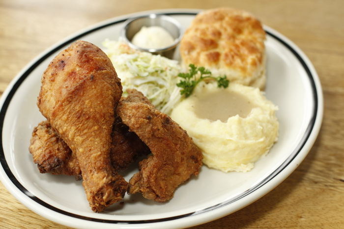 SEATTLE WA SUNDAY OCT 15, 2012 Kickin' Boot in Ballard offers an assortment of barbecue inspired dishes in the dark restaurant with large TVs and a pyramid of various bottled liquors. Photo by Kevin P. Casey/Seattle Weekly