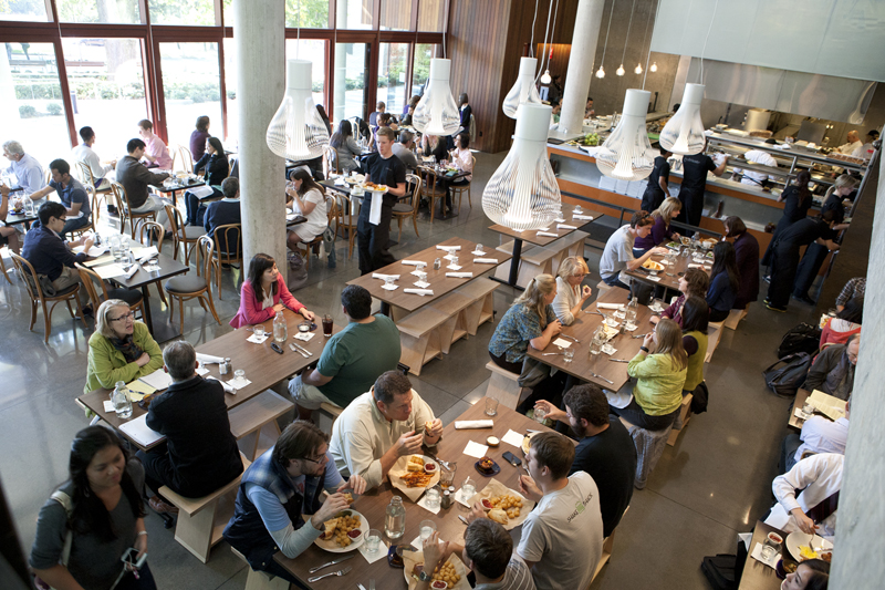 The local establishment which Cultivate most closely resembles in appearance is Skillet Diner. As at the Capitol Hill restaurant, the gray-walled and generously-windowed dining room is configured around an ell-shaped counter, with partially-bald light bulbs hung above each place setting. Cultivate has a similarly industrial aesthetic, with columns and an exposed floor.