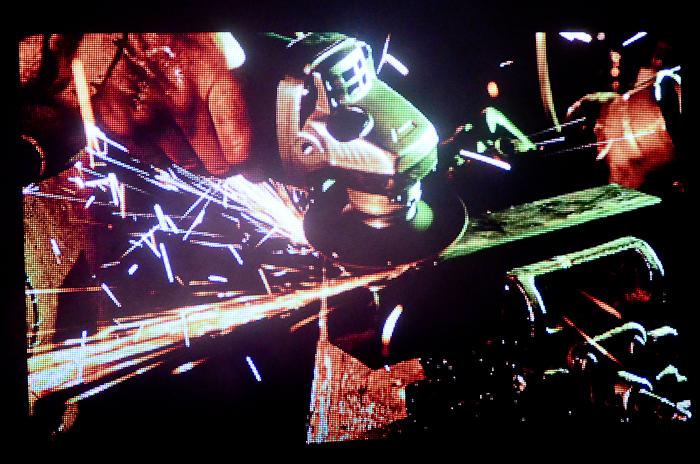 The concert began as over-the-top film played on a large screen behind the stage.