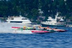 Vintage Hydroplanes race, powered by massive V12 engine blocks.