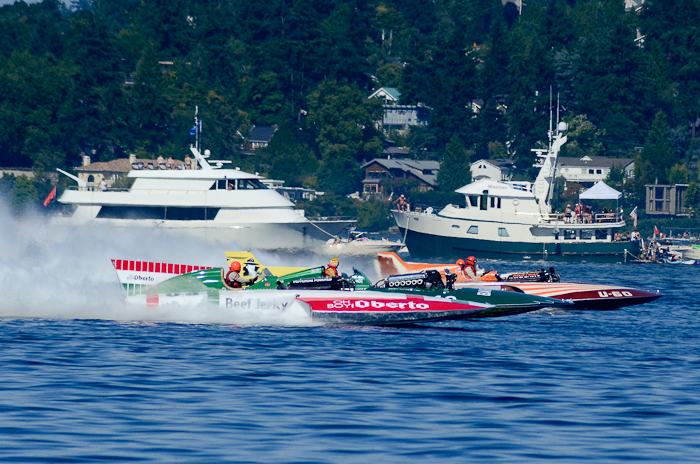 Vintage Hydroplanes race, powered by massive V12 engine blocks.